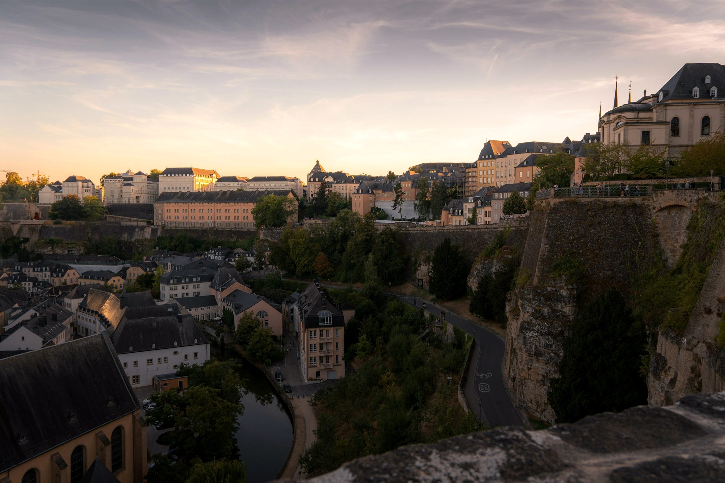 Luxembourg City Grund district and ramparts at golden hour