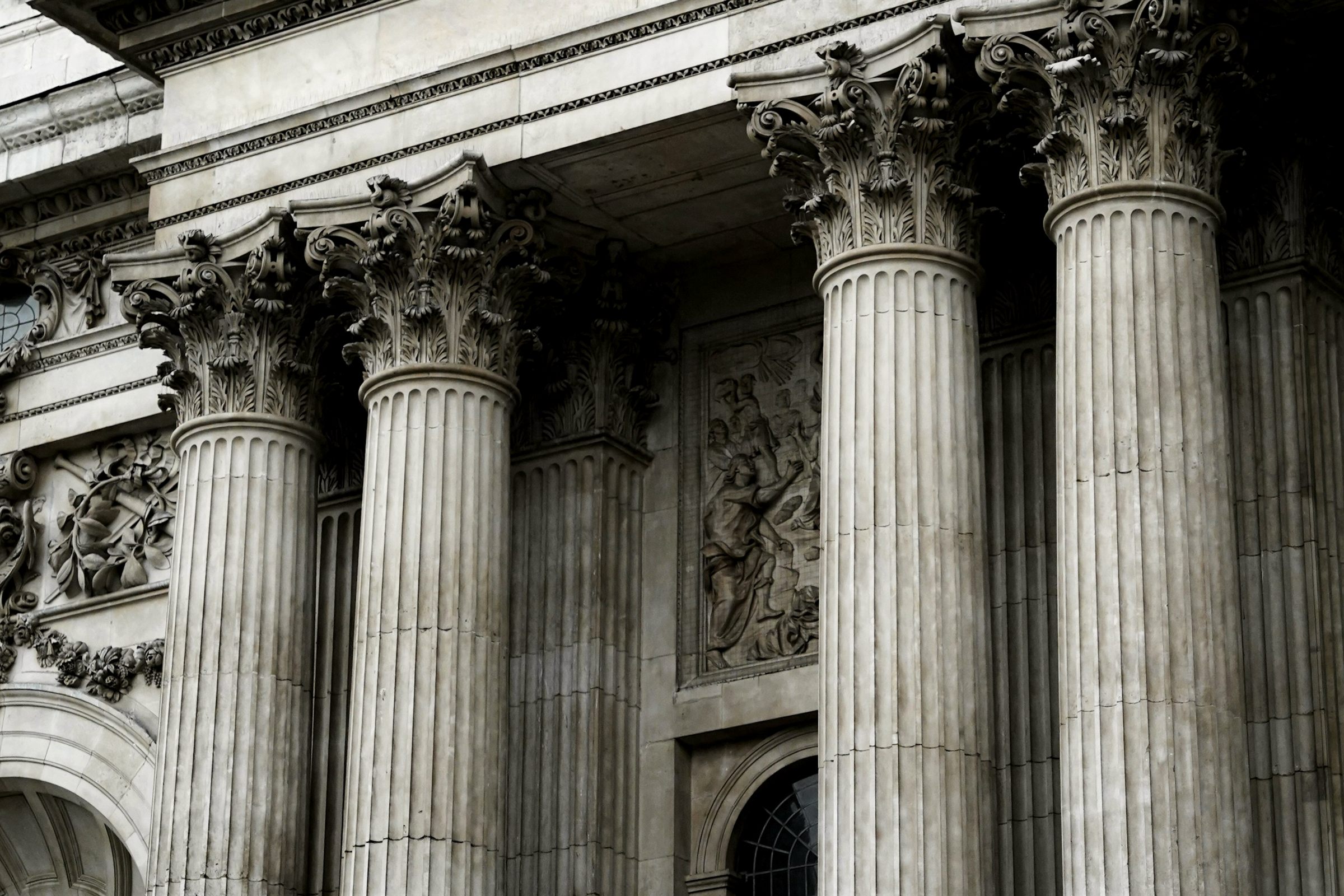 Grand stone Corinthian columns of a classical bank building