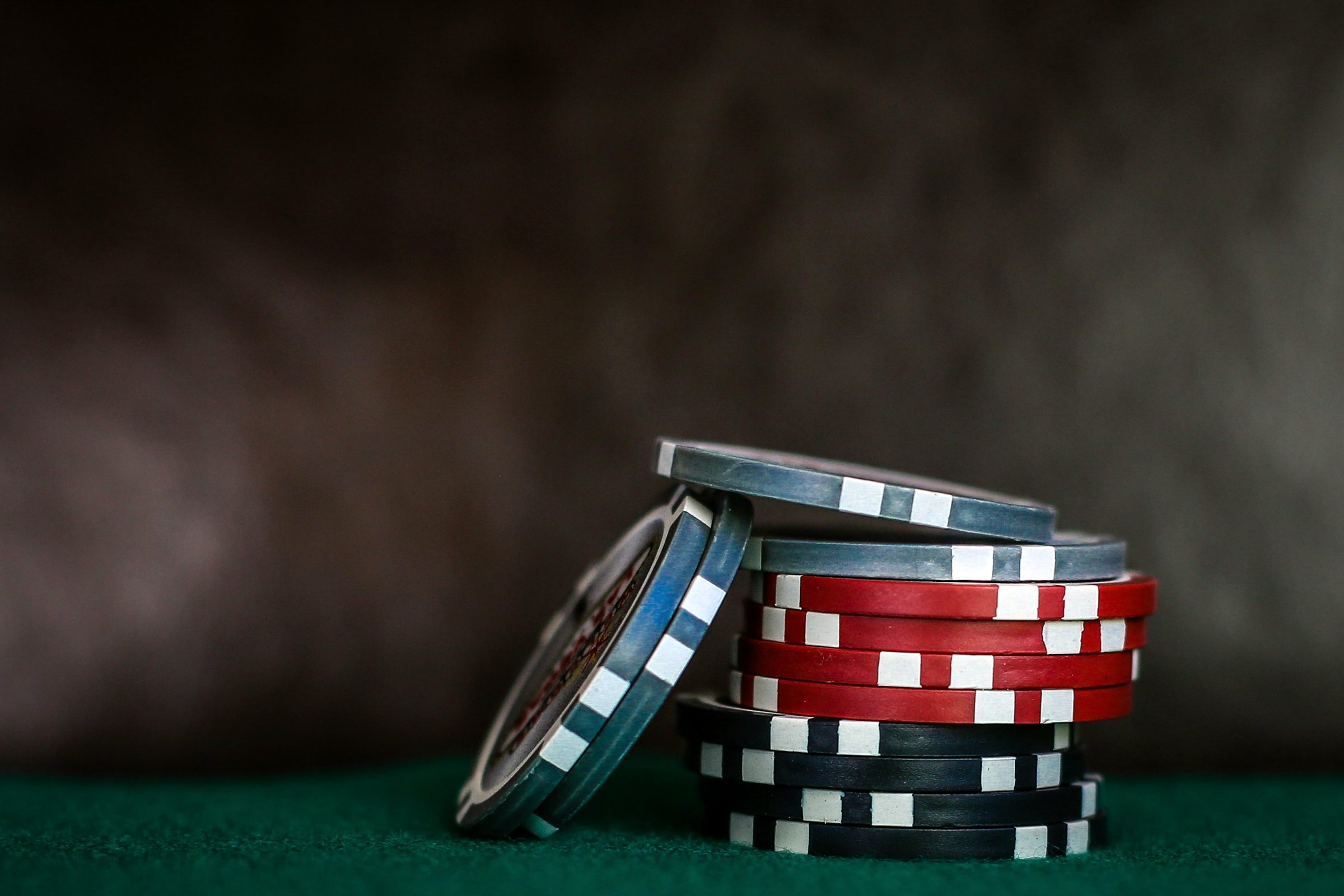 Poker chips on green felt